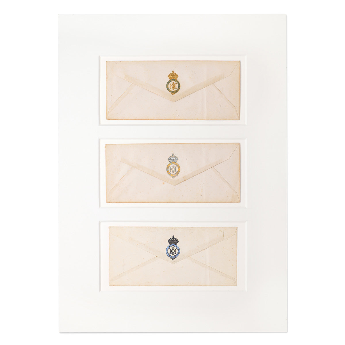 Three framed envelopes with historic Hawaiian insignias