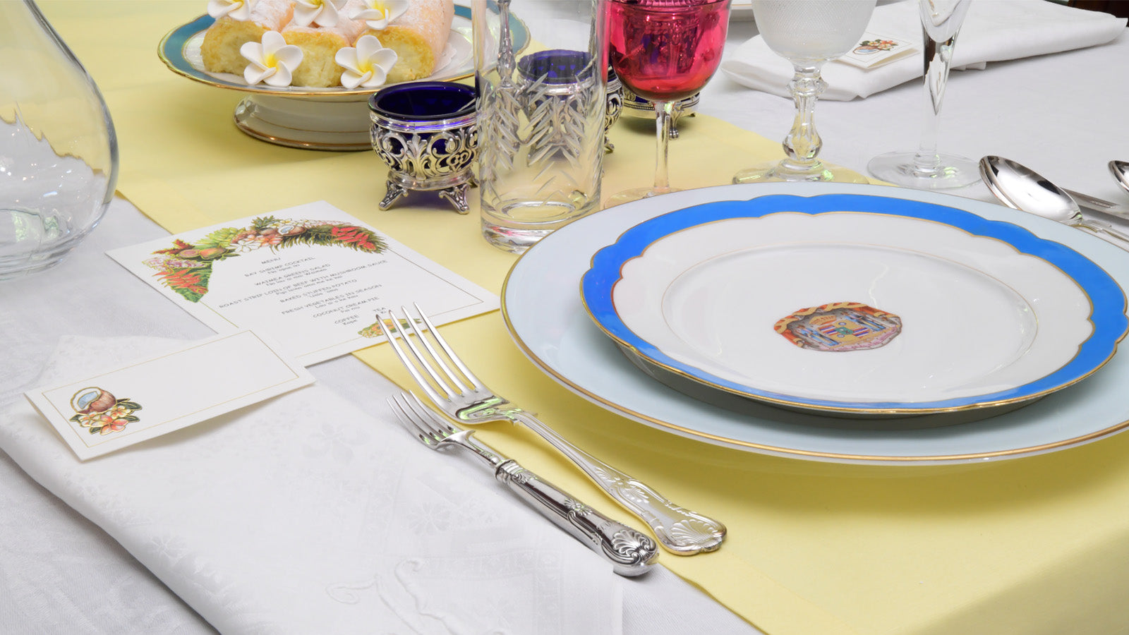 Hawaii Fine Stationers menu and placecard shown with historic Hawaiian placesetting