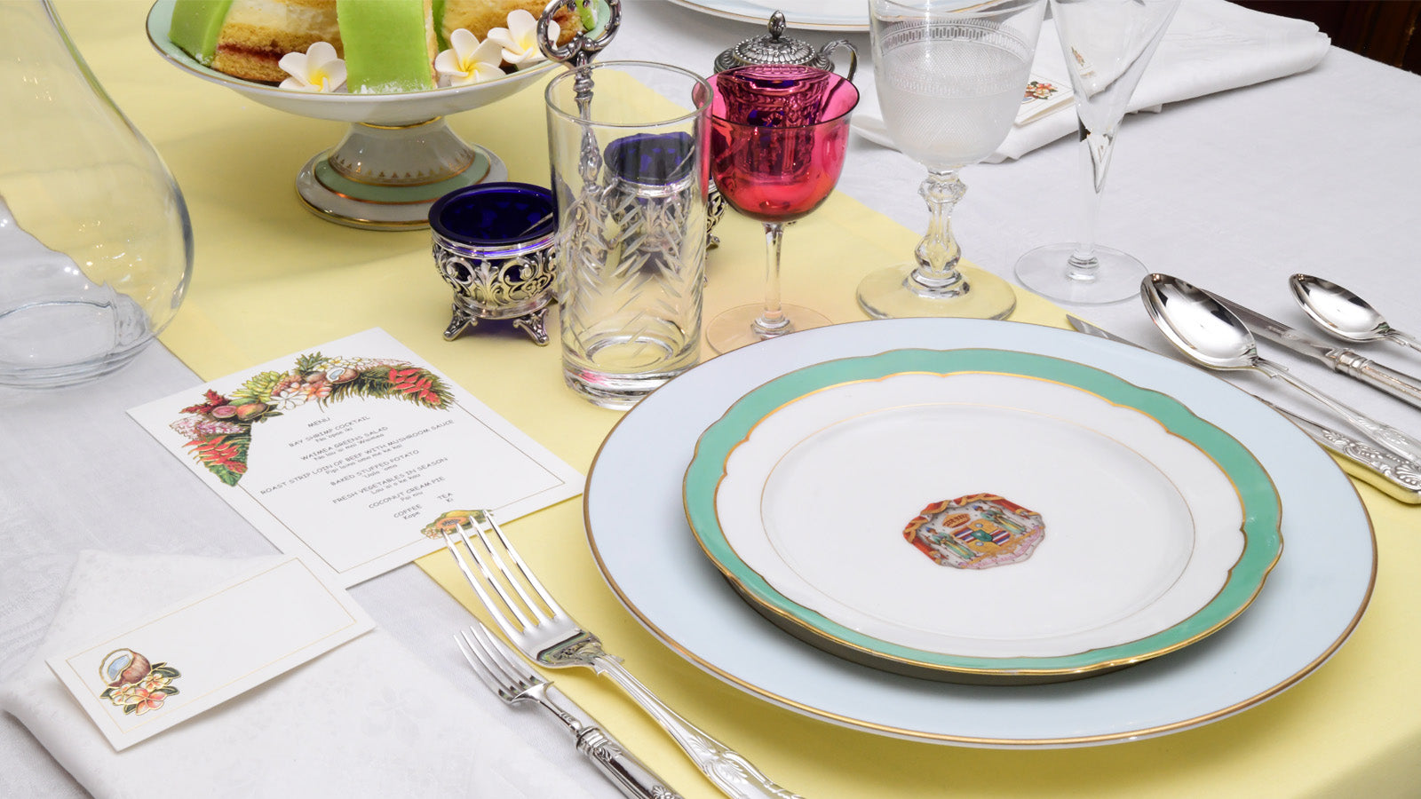 Hawaii Fine Stationers menu and placecard shown with historic Hawaiian placesetting